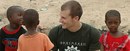 Kyle Nedlik with Gambian children